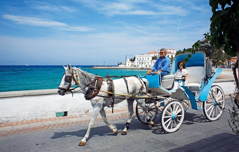 Horse-drawn carriages serve destinations in the town and  to nearby beaches on the island. 